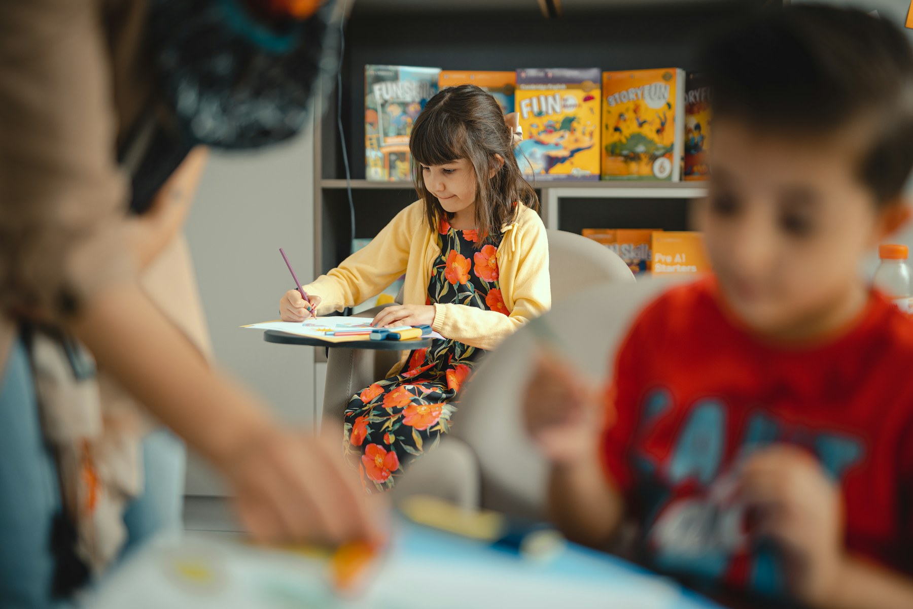 Students explore a creative learning activity together.